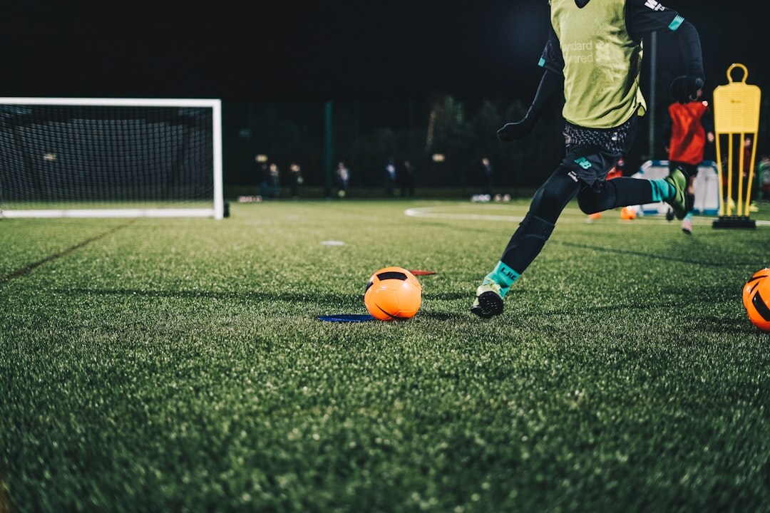 young soccer player training